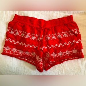Red fringed shorts